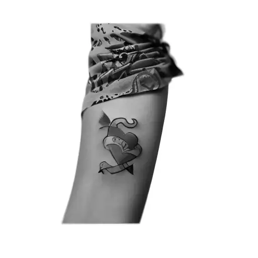 A Tattoo Of A Heart And An Arrow