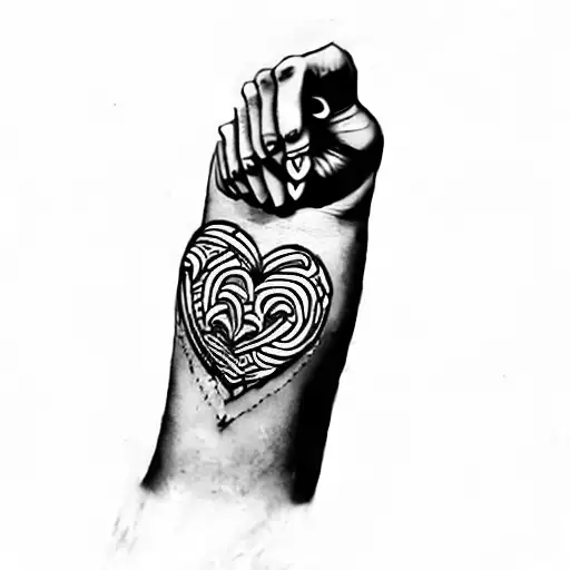 A Tattoo Of A Heart And An Arrow