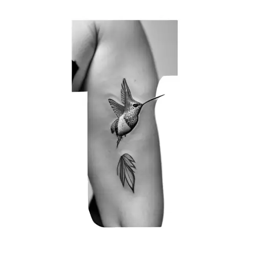 A Hummingbird And Flowers