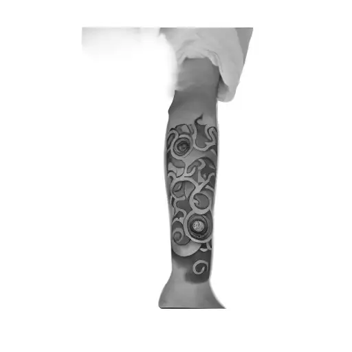 A Tattoo Of A Bloody Moon And Crying Eye Ball In A Triangle With The Name Leek