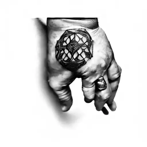 A Man Holding A Rosary