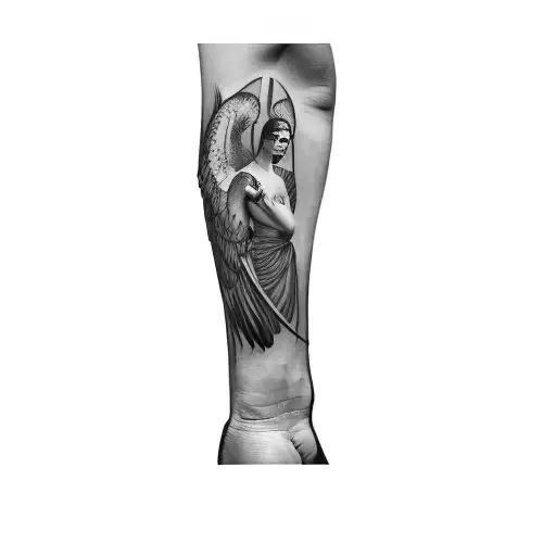 A Tattoo Of An Angel And A Man With A Sword