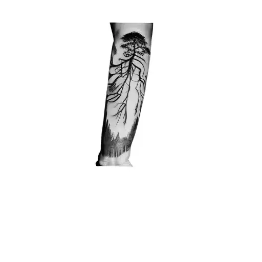 A Man With A Tattoo Of A Tree On His Forearm