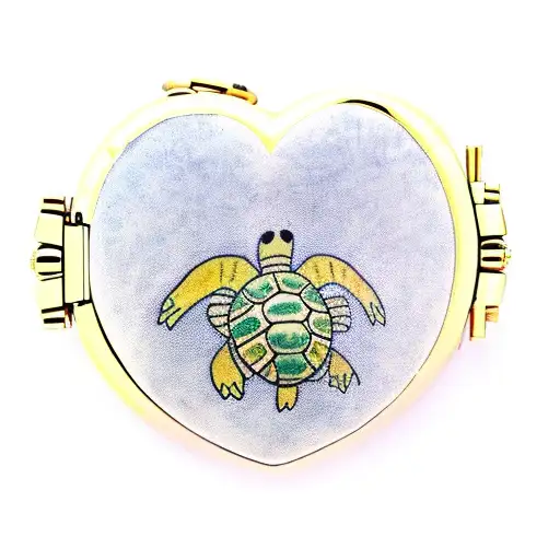 A Traditional Heart-shaped Locket With A Turtle Inside